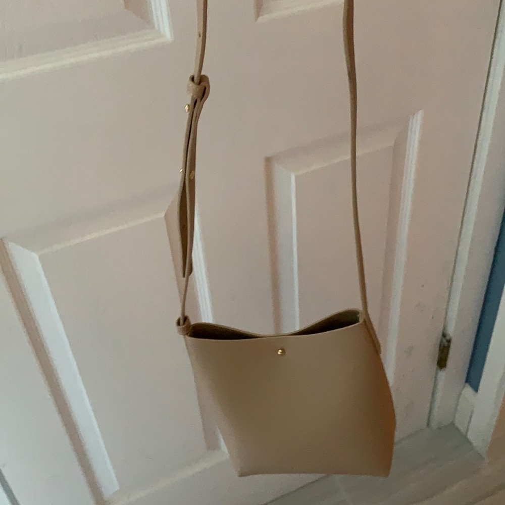 Tan BRAND NEW in original packaging Samara purse.